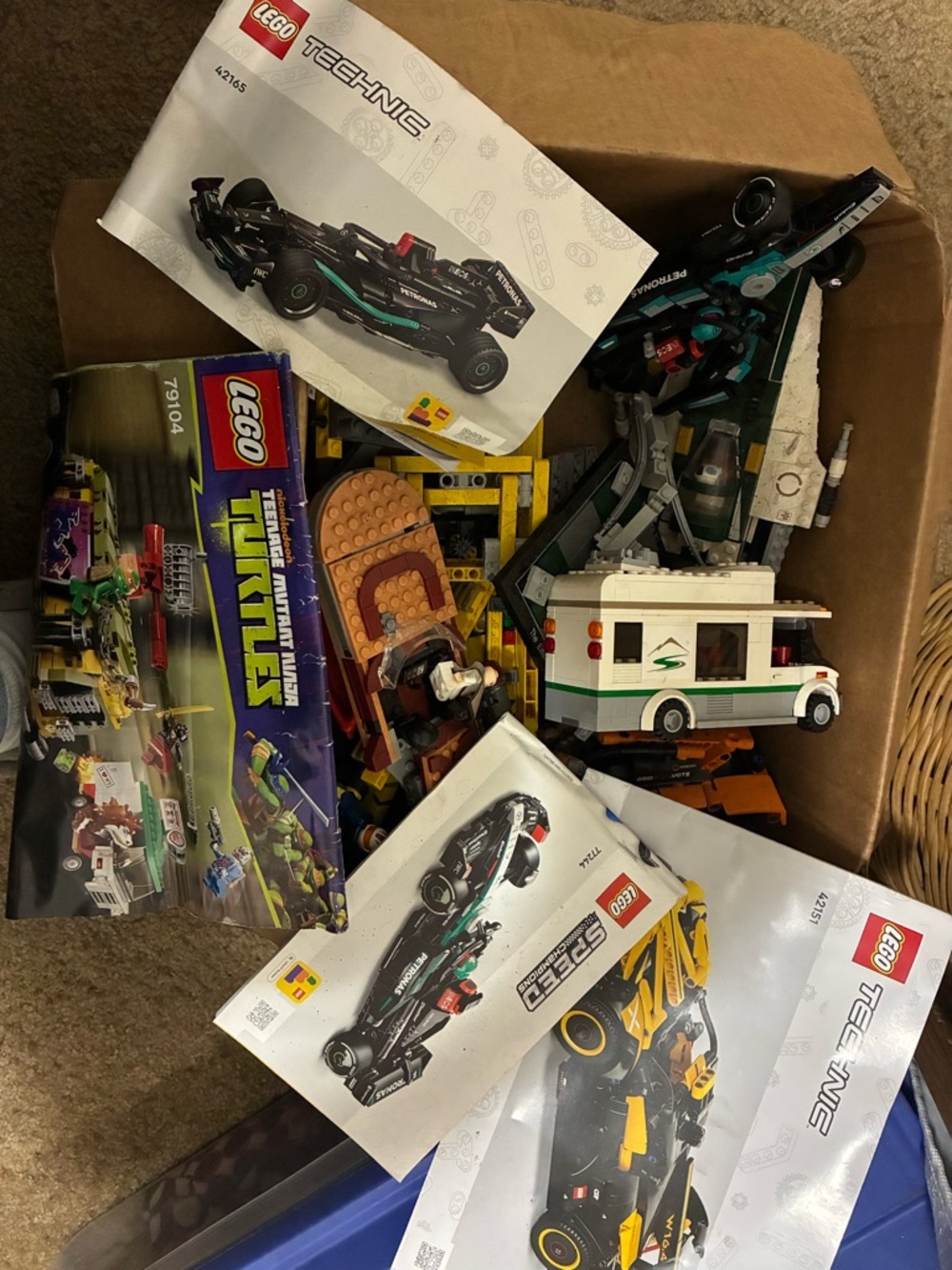 Box of assorted Lego sets